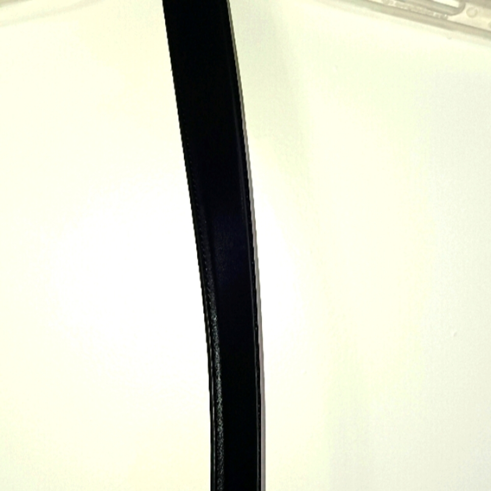 Mens Black belt with silver buckle size 34 bought at Sears new with tag